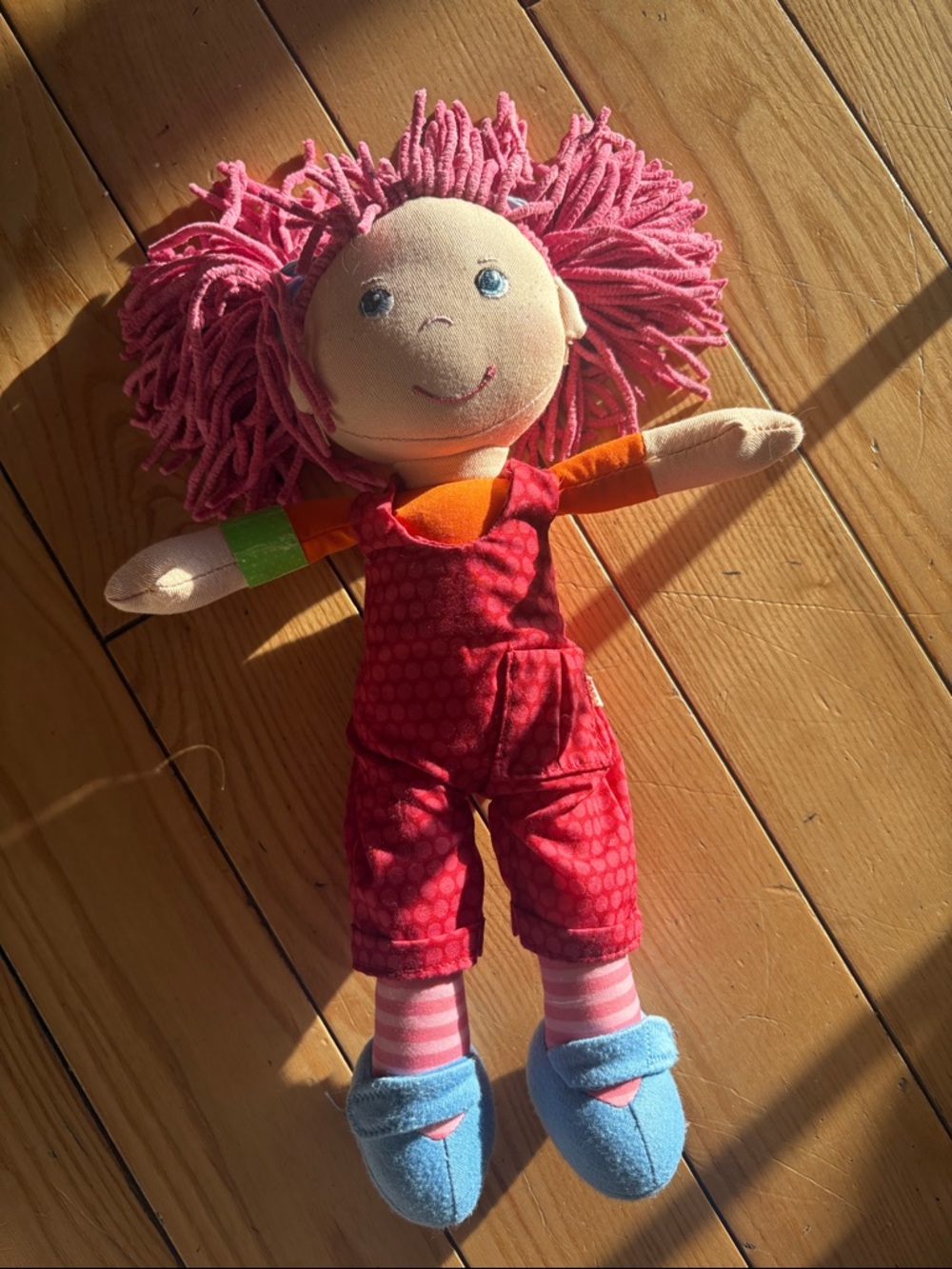 HABA Lilli-Lou Soft Doll with Red Overalls and Blue Shoes